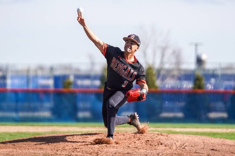 Plainfield East's Danny Schuch (3) delivers a pitch against Oswego during a baseball game at Oswego High School on Tuesday, April 9, 2024.