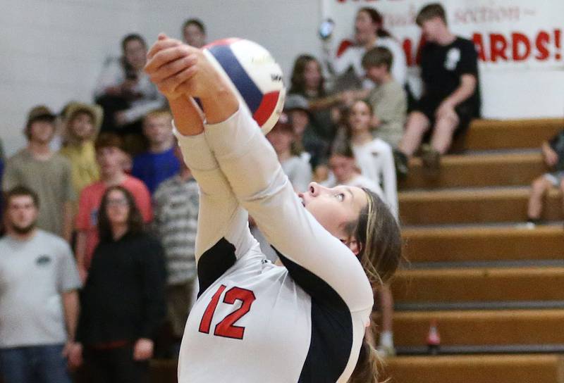 Henry-Senachwine's Kaitlyn Anderson returns a serve from Woodland on Thursday, Oct. 3, 2024 at Henry-Senachwine High School.