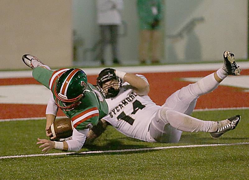 L-P's Mason Lynch (3) recovers a fumble as Sycamore's Kiefer Tarnoki (14) fails to gain possession on Friday, Oct. 14, 2022 at Howard Fellows Stadium in Peru.