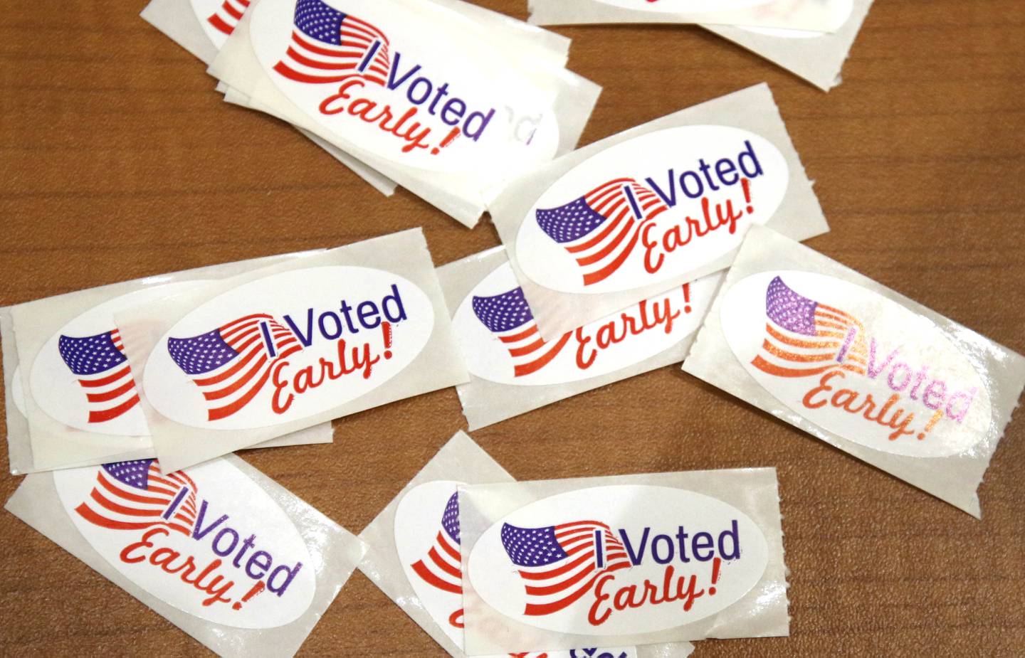 Stickers await people who cast their ballots on the first day of early voting Thursday, May 19, 2022, at the polling place in the DeKalb County Legislative Center in Sycamore. Any registered voter in DeKalb County may choose to vote early, in person or through the mail, ahead of the June 28 primary election.