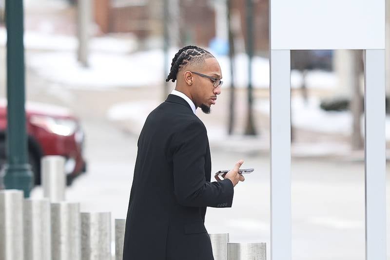 Joliet Police Officer Christopher McClinton leaves the Will County Courthouse after an arraignment on Wednesday, Dec. 31, 2025 in Joliet. McClinton is was charged with a felony for allegedly using a counterfeit $100 bill to buy lottery tickets July 13, 2025.