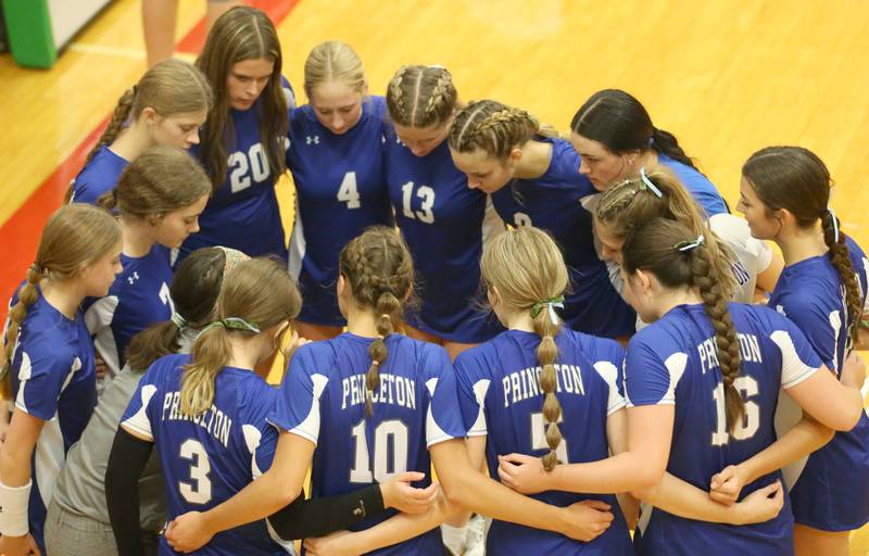 Members of the Princeton volleyball team huddle before facing L-P on Tuesday, Aug. 22, 2023 in Sellett Gymnasium.