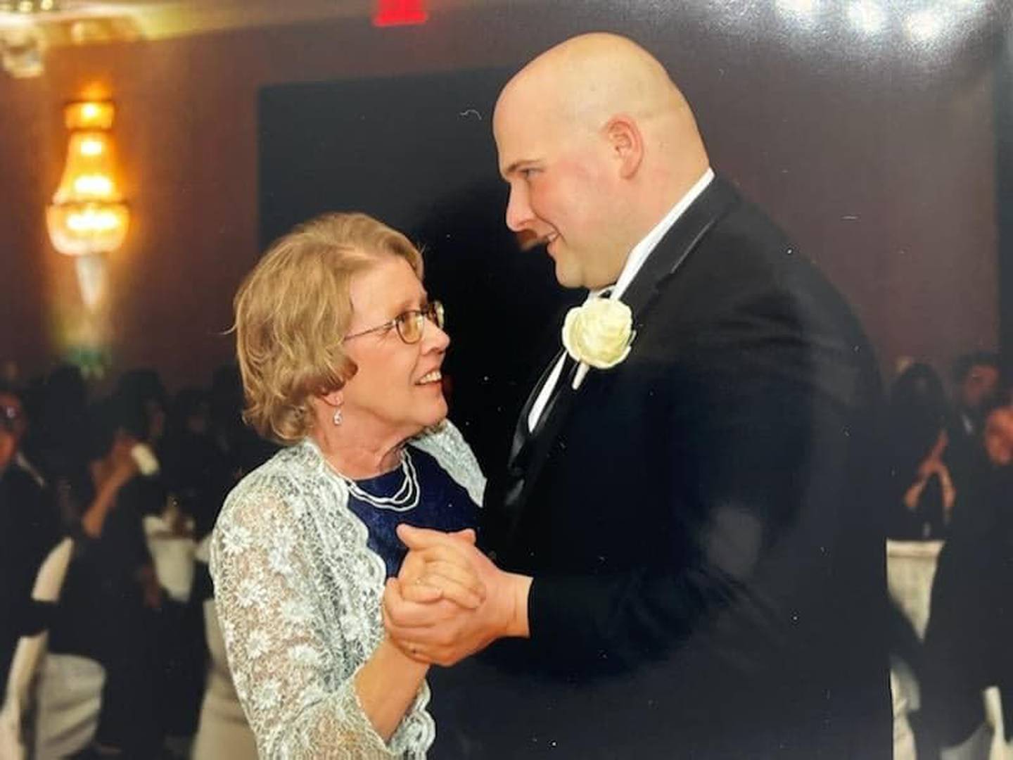 Betty Morman, formerly of Channahon, dances with her son Joshua Pantol of Naperville. Morman saw nursing more as a vocation than a career and had a nurse's heart from her earliest days.