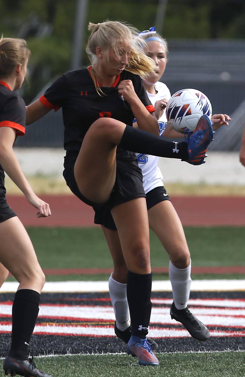 Libertyville’s Jenna Krakowski tries to kick the ball towards the goal in front of Lincoln-Way East's Kara Waishwell during the IHSA Class 3A state third-place match at North Central College in Naperville on Saturday, June 3, 2023.