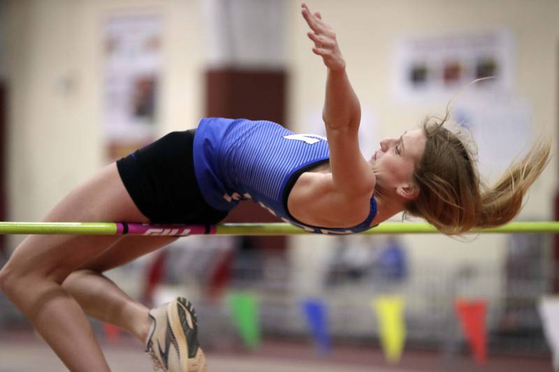 St Charles North’s Ella Brown-Chase competes in the high jump during the DuKane Girls Indoor Championship track meet Friday March 18, 2022 in Batavia.