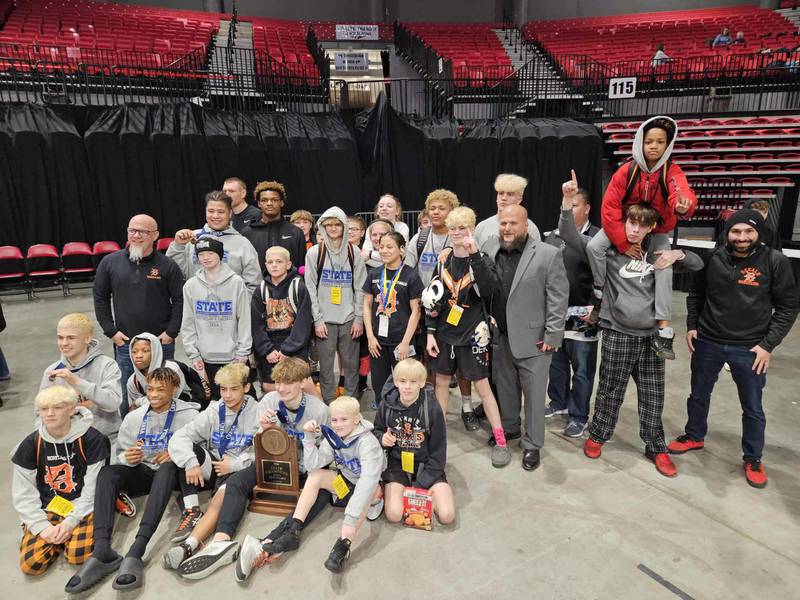 The Huntley Middle Wrestling team celebrates its state title on Saturday, March 9, 2024 at the NIU Convocation Center.