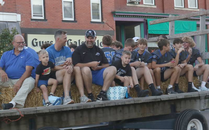 The Princeton High School football team rides during the homecoming parade on Thursday, Sept. 25, 2025 along South Main Street in Princeton .