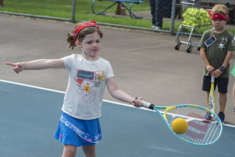 Maggie Shaddick plays the ball while competing in the tiny tots event at the Emma Hubbs Tennis Classic Monday, July 25, 2022.