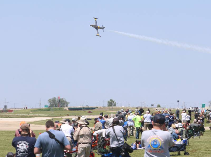 A Lockheed T-33 Shooting Star flies over the crowd during the 11th annual TBM Reunion and Air Show on Friday, May 15, 2026 at the Illinois Valley Regional Airport in Peru.