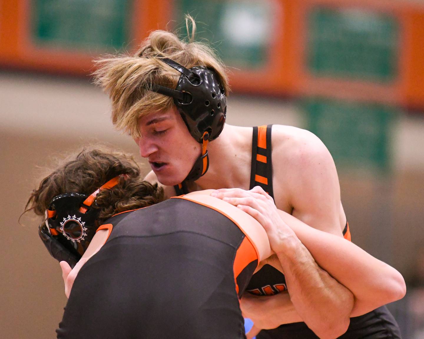 DeKalb’s Tyler Daub wrestles against St. Charles East’s Kaden Potter on Monday, Dec. 29, 2025, in the 126-weight class during the Flavin Invite held at DeKalb High School.