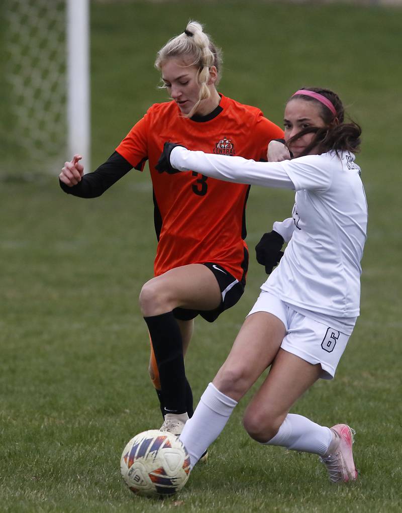 Kaneland's Zoe Gannon kicks the ball away from Crystal Lake Central's Tessa Horist during a nonconference soccer game on Thursday, April 10, 2025, at Crystal Lake Central High School.