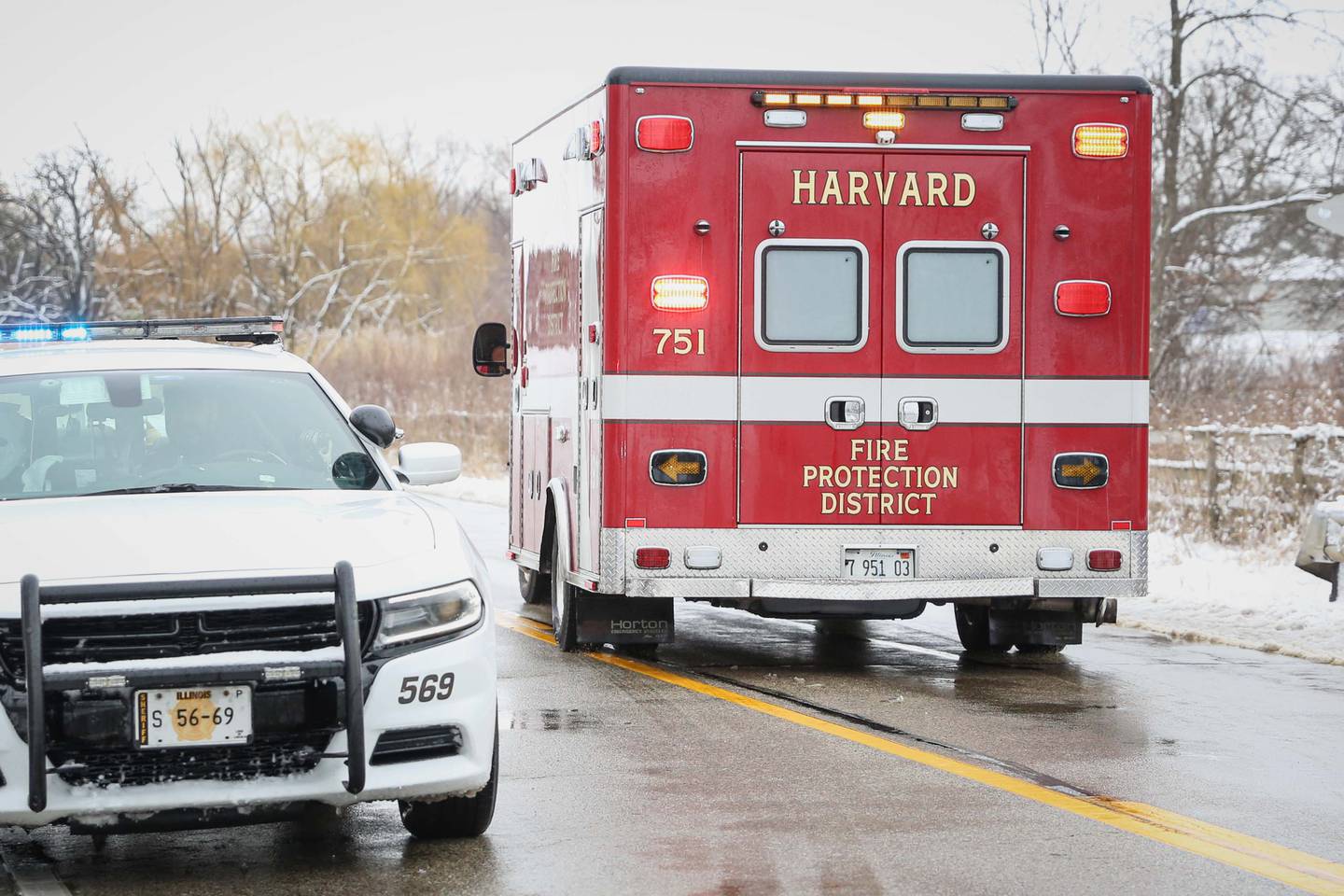 A car fell down an embankment near a creek Sunday, March 16, 2025, near Harvard.