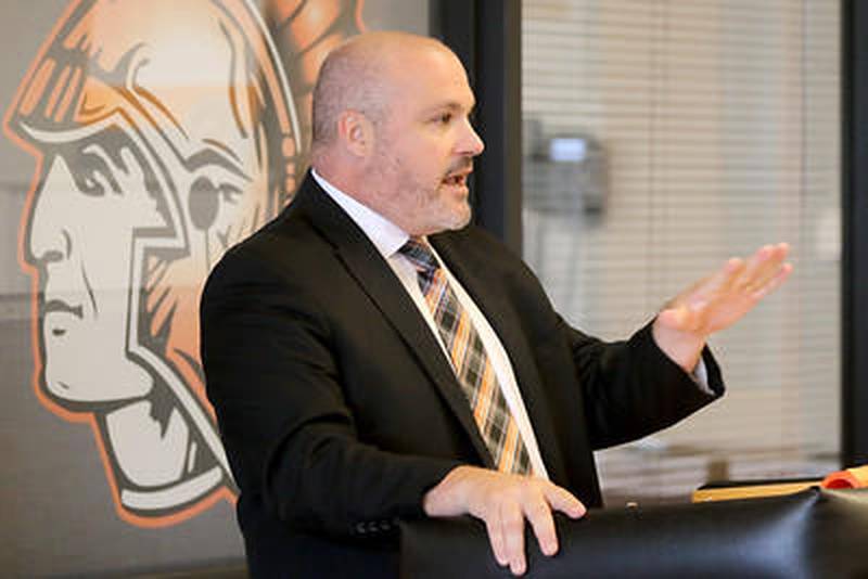McHenry High School District 156 Superintendent Ryan McTague addresses the community during a ribbon-cutting ceremony for an incubator program at McHenry West High School on Aug. 24.