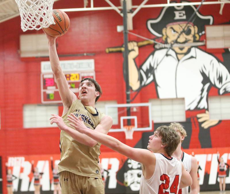 Serena's Richie Armour runs in the lane to score on a layup over Earlville's Ryan Browder on Friday, Feb. 9, 2024 at Earlville High School.