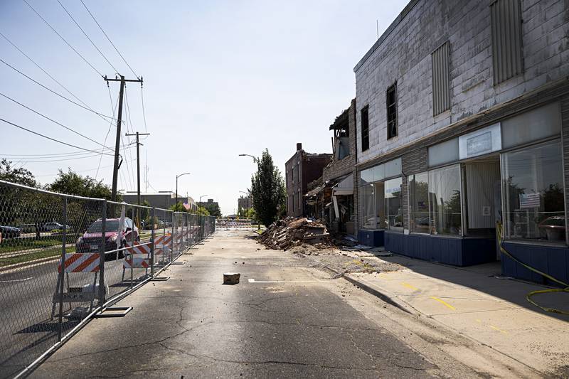 The ATF National Response Team has cleared the scene of the downtown apartment building destroyed by a July 7 fire in Sterling. Demolition will need to be handled by the owner himself.
