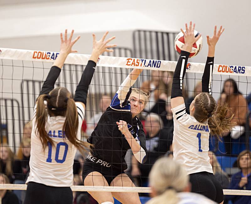Newark’s Adrianna Larson hammers a shot into the Galena defense Monday, Oct. 30, 2023 at the Eastland 1A volleyball sectional.