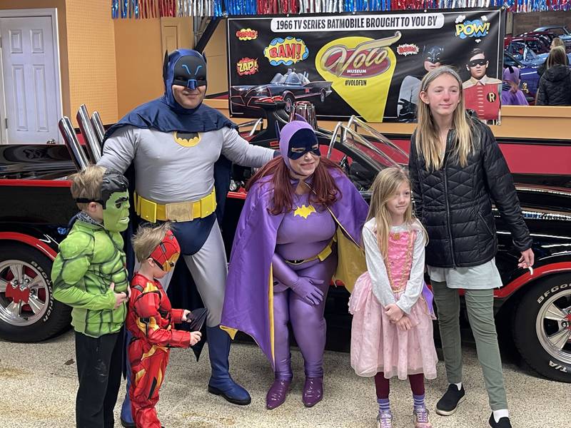 Members of Costumers With a Cause and visitors to the Volo Museum enjoy a photo opp in front of the Batmobile during a previous Princess and Superhero Day. This year, the event takes place Saturday, March 25.