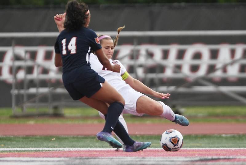 Lincoln-Way Central’s Grace Grundhofer takes shot against Evanston’s Nalah Dominguez in the Class 3A IHSA state girls soccer third-place game in Naperville on Saturday, June 4, 2022.