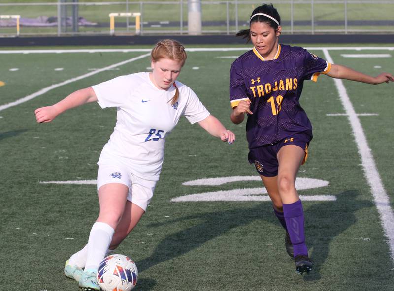 Princeton's Kayleigh kicks the ball past Mendota's Sienna Gonzalez during the Class 1A Regional semifinal game on Tuesday, May 9, 2023 at Mendota High School.