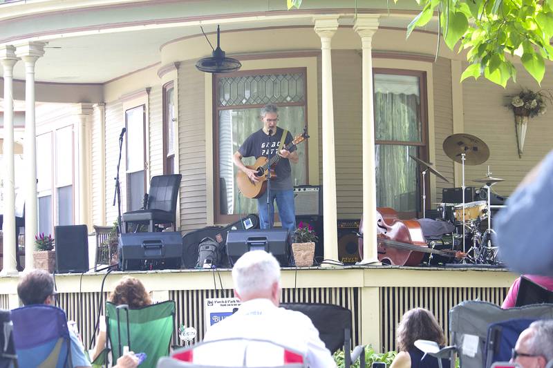 Singer and songwriter Pierce Pettis performs in the 600 block of Western Avenue in Joliet as part of the Porch and Park Music Fest on Saturday, Aug. 16, 2025.