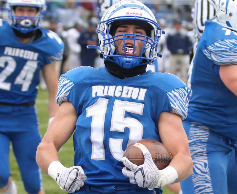 Princeton's Augie Christiansen (15) reacts after scoring the Tigers first touchdown against IC Catholic in the Class 3A Quarterfinal game on Saturday, Nov. 12, 2022 in Princeton.