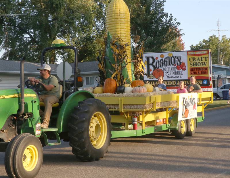 The Boggios Orchard and Produce float rides during the inaugural Homecoming parade on Wednesday, Sept. 17, 2025 down Elm Street in Granville.