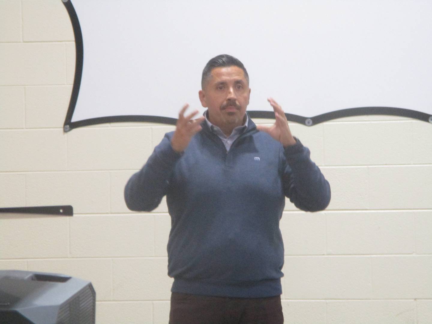Joliet Councilman Cesar Cardenas speaks to people who came to a community meeting held Wednesday on future use of the Joliet Correctional Center property. Oct. 22, 2025