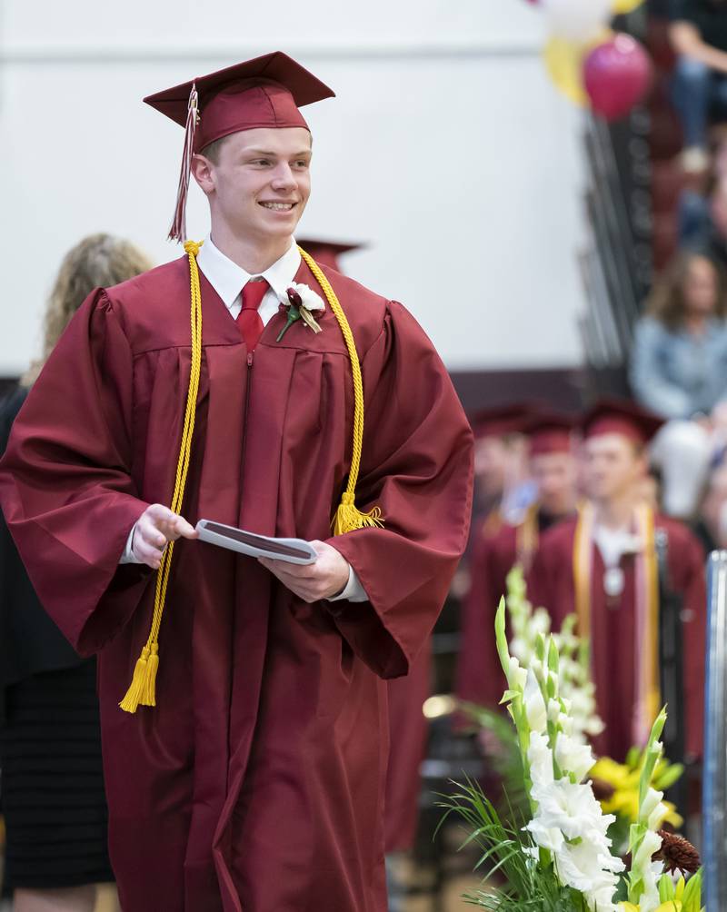 Graduating senior Zachary Brown smiles after receiving his diploma during a graduation ceremony for the class of 2022 at Richmond-Burton Community High School on Sunday, May 22, 2022 in Richmond. Ryan Rayburn for Shaw Local