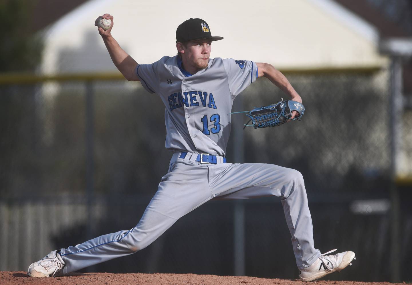 Geneva pitcher Seth Kisner throws to a Glenbard North batter during Tuesday’s baseball game in Carol Stream.