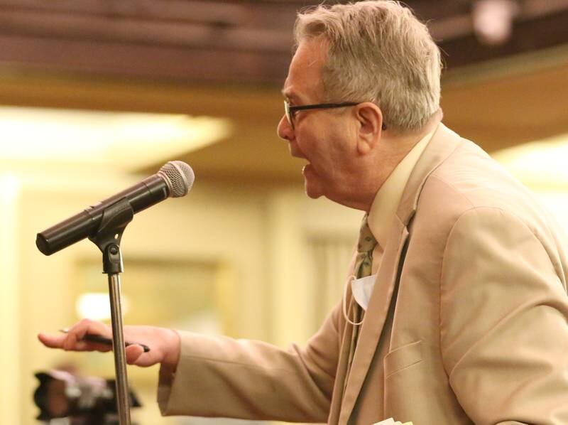 La Salle City attorney Jim McPhedran speaks during the Carus town hall meeting on Wednesday, May 10, 2023 in Matthiessen Auditorium at LaSalle-Peru Township High School