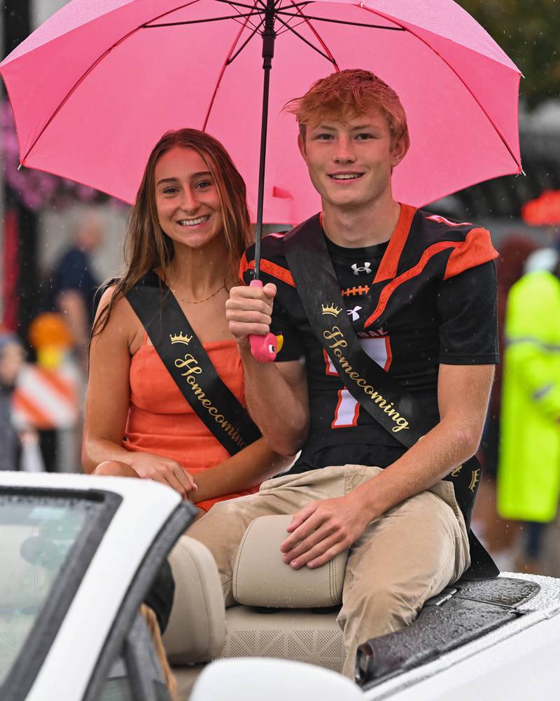 Members of the Crystal Lake Central H.S. homecoming court seen during their 100 year anniversary homecoming day parade on Saturday, Sep. 16, 2023 in Crystal Lake. The parade began at the high school and made its way through downtown Crystal Lake.