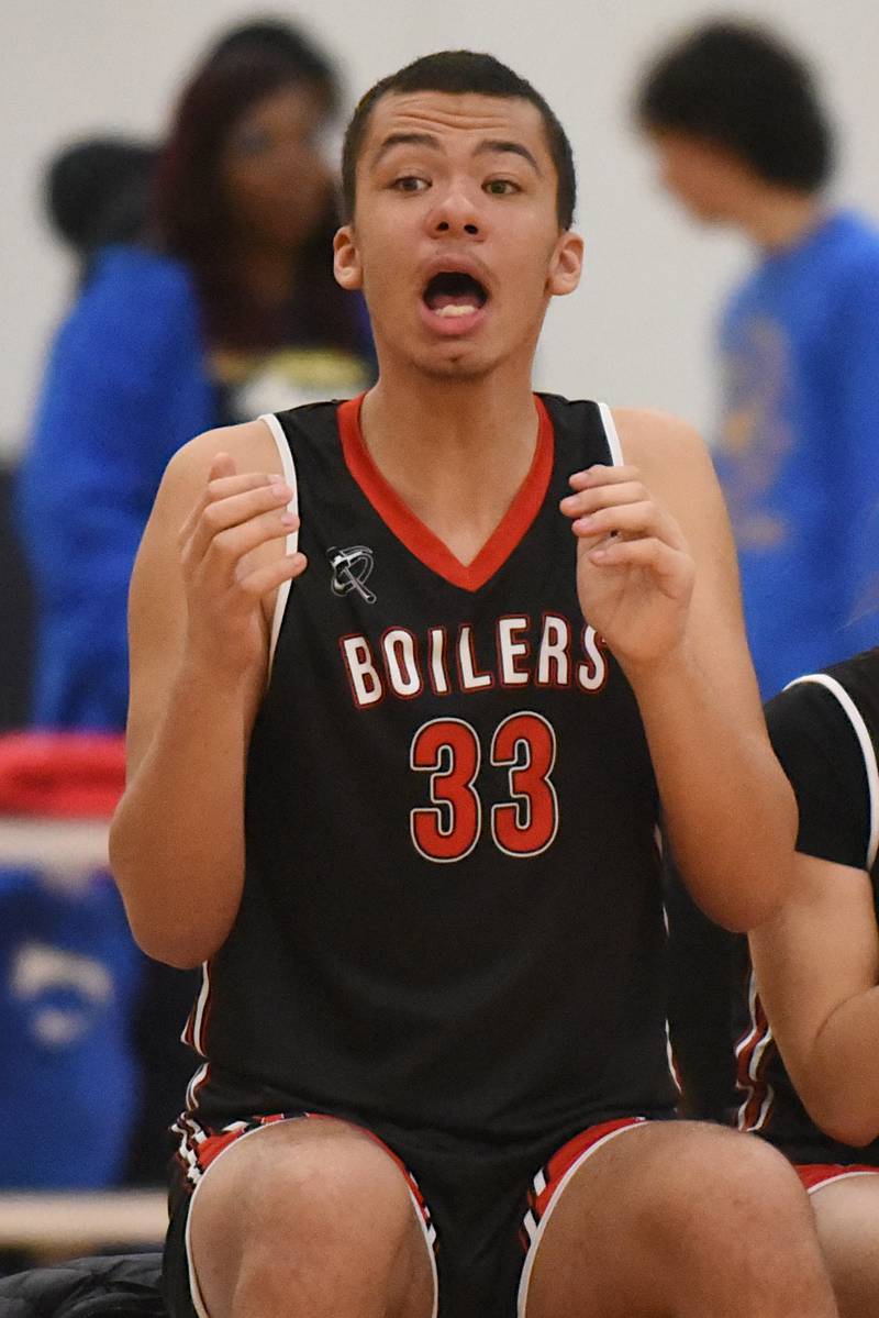 Bradley-Bourbonnais' Anthony Boyce cheers on his Boilermaker teammates during the IHSA Class 2A Special Olympics Unified State championship against Vaughn/St. Patrick at the University of Illinois Activities and Recreation Center Saturday, March 14, 2026.
