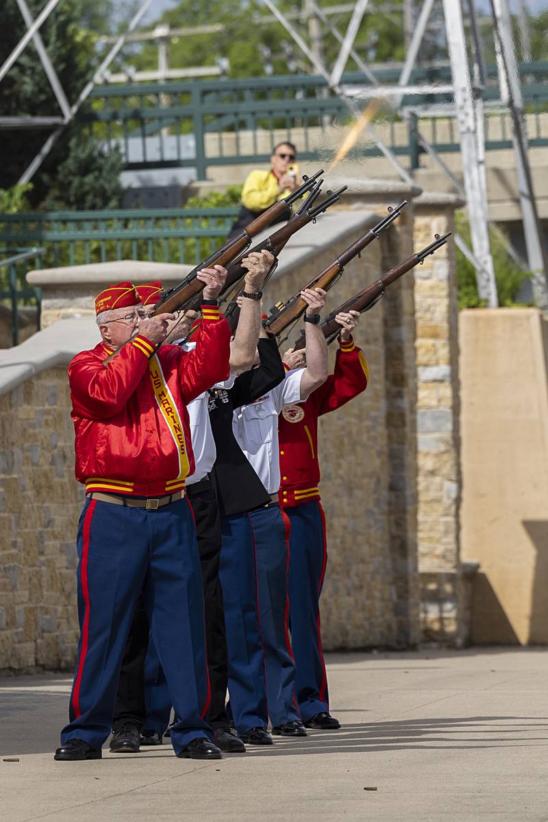 A volley of shots is fired Monday, May 27, 2024, at the Dixon riverfront.