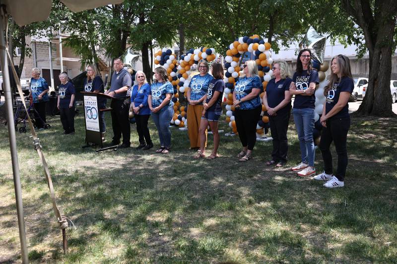 Village Administrator George Schafer stands with members of the Lemont Area Historical Society at the Lemont 150th Anniversary Commemoration on Friday, June 9, 2023 in downtown Lemont.