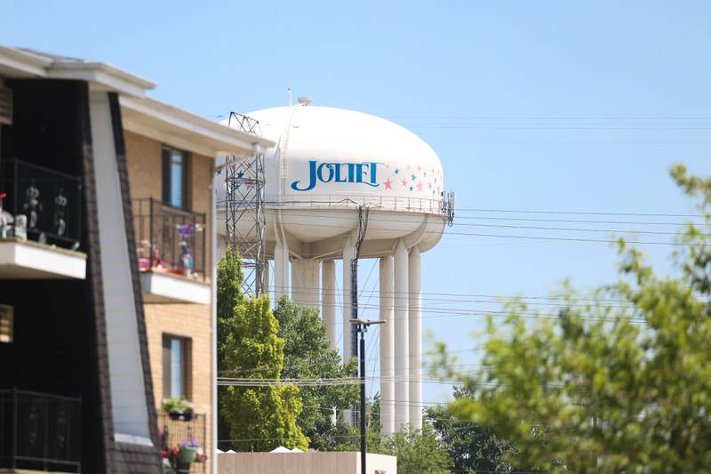 A Joliet water tower sits off in the distance from an apartment complex in Joliet. Monday, July 18, 2022 in Joliet.