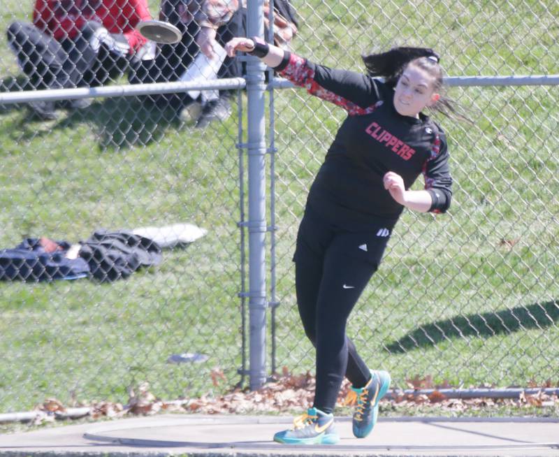 Amboy's Kimber Zitelman throws discus during the Rollie Morris Invite on Saturday, April 16, 2022 at Hall High School in Spring Valley.