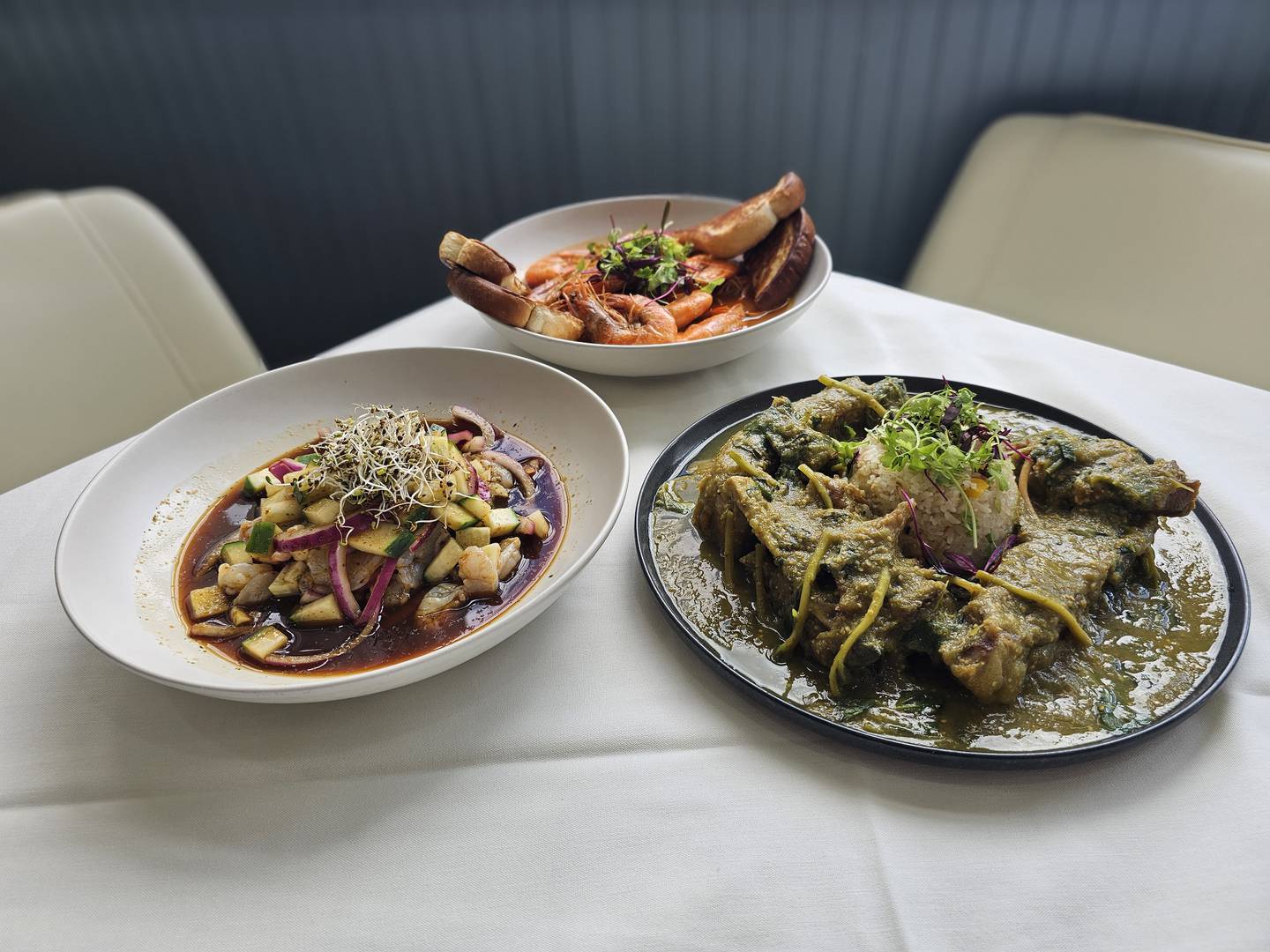 Ikal Y Sanse, at 40W222 LaFox Road, Campton Hills will offer traditional Mexican dishes. The top plate is camarones cucharacha, or spicy shrimp; the left is aguachile, a shrimp dish; and the right is costillas de puerco, pork ribs cooked in green tomatillo chile and purslane.