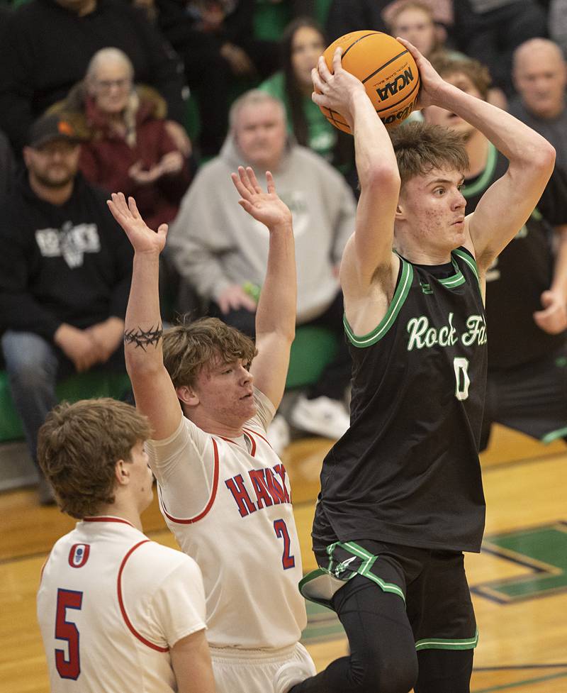 Rock Falls’ Max Burns looks to make a pass against Oregon Wednesday, Feb. 25, 2026, in the Class 2A regional semifinal at Rock Falls High School.