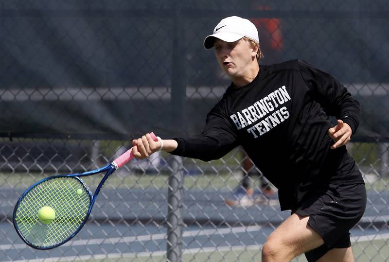 Barrington's Gabe Mills returns the ball during an IHSA 2A boys doubles tennis match Thursday, May 25, 2023, at Buffalo Grove High School.