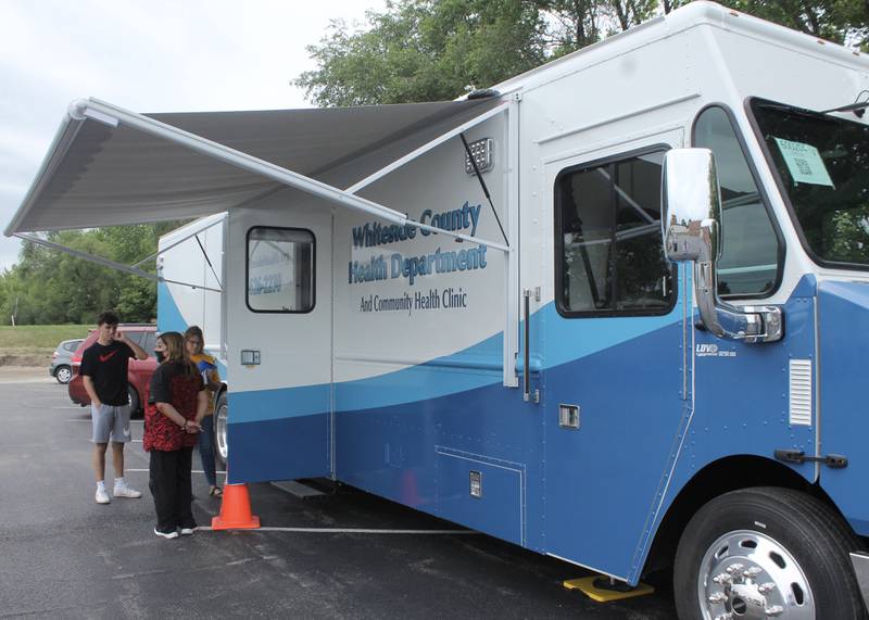 The Whiteside County Health Department mobile unit was making its trial run, said the department's Cheryl Lee, on Friday, July 9, 2021, at the Rock Falls High School parking lot. The vaccination clinic was timed to provide the Pfizer vaccine to students ages 12 and older so they would be able to get a second dose in three weeks in time for the start of school in August. The Illinois Department of Public Health said on Friday it would adhere to Centers for Disease Control and Prevention guidelines for schools.