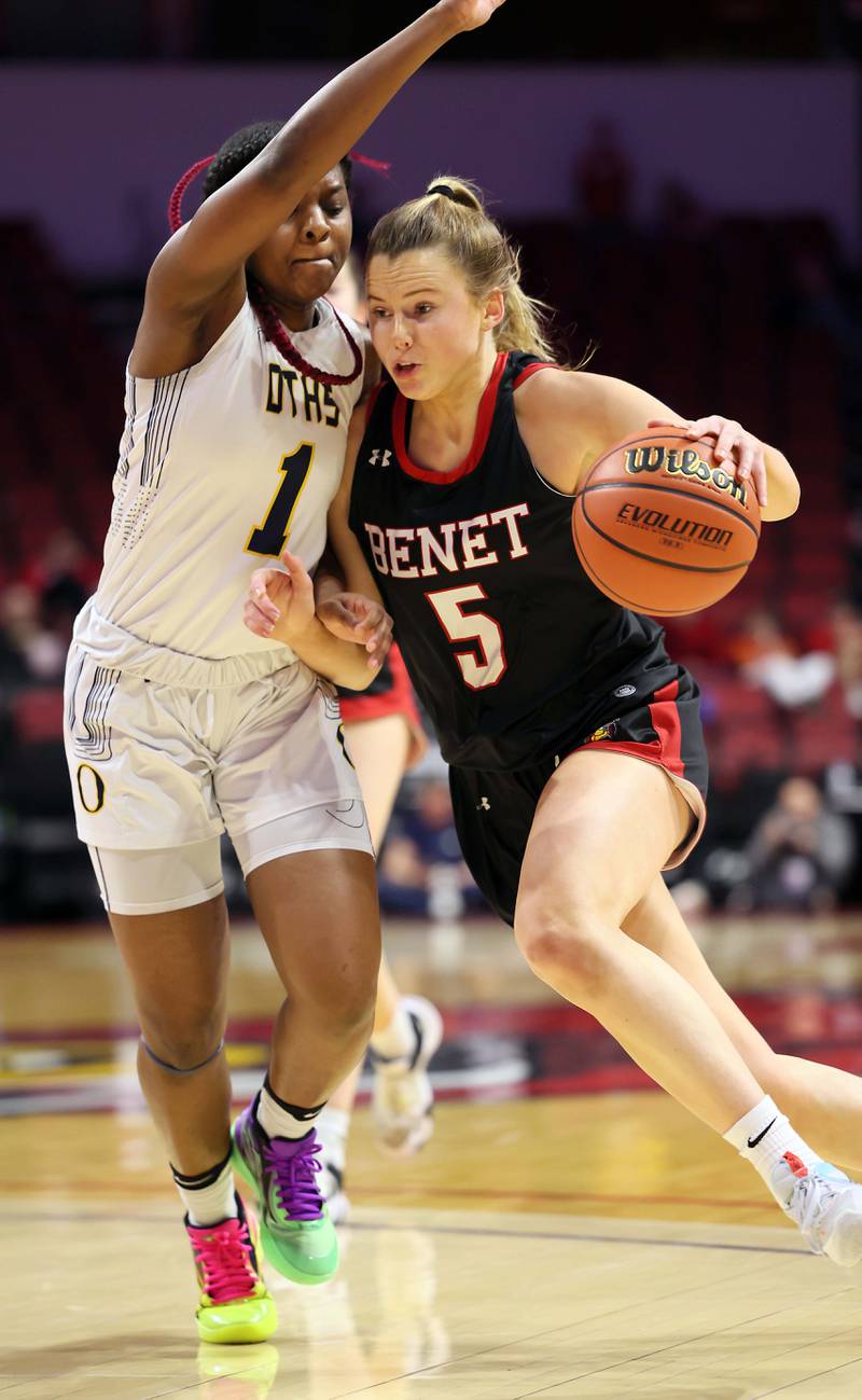 Benet Academy's Lenee Beaumont (5) drives to the lane as O'Fallon's Jailah Pelly (1) pressures her during the IHSA Class 4A girls basketball championship game at the CEFCU Arena on the campus of Illinois State University Saturday March 4, 2023 in Normal.