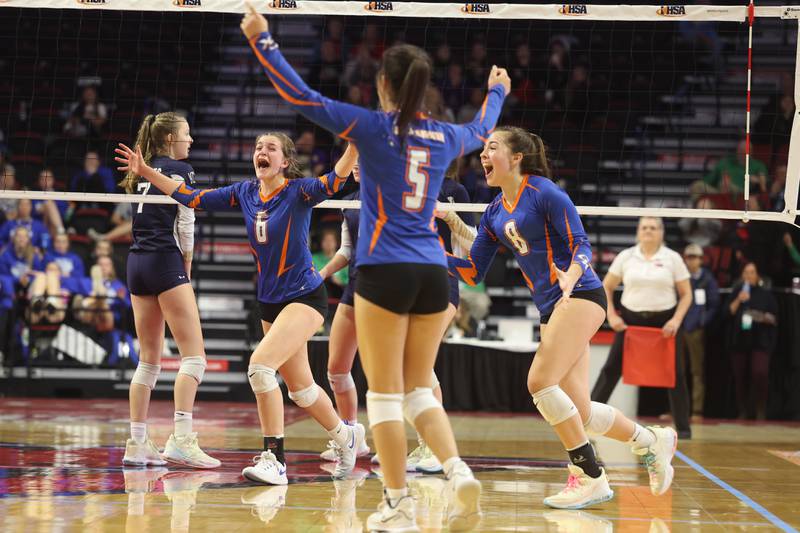 Genoa-Kingston celebrates a two set win over IC Catholic in the Class 2A championship match on Saturday in Normal.