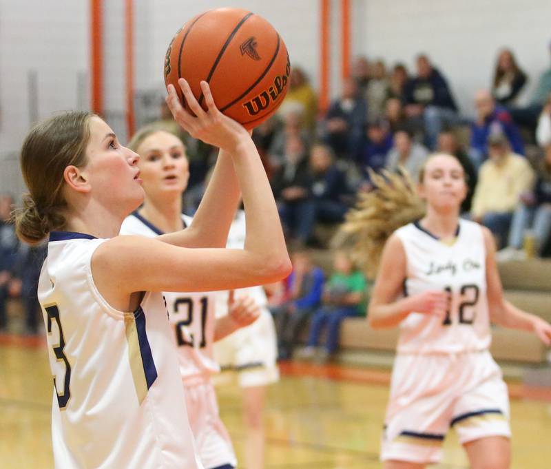 Marquette's Chloe Larson pulls up in the lane to score a basket against Fieldcrest during the Integrated Seed Lady falcon Basketball Classic tournament on Monday, Nov. 13, 2023 at Flanagan High School.