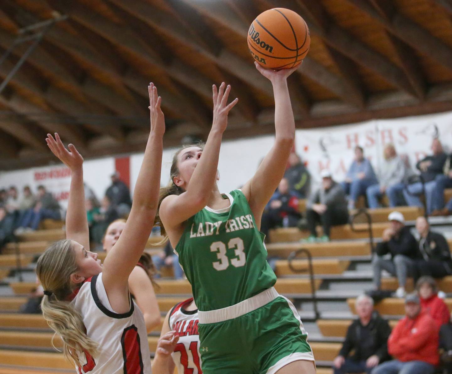 Seneca's Audry McNabb runs in the lane to score on a layup as Henry-Senachwine's Grace Anderson defends on Monday, Jan. 13, 2024 at Henry-Senachwine High School.