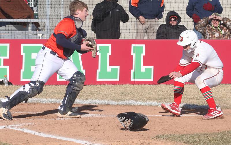 Pontiac catcher Jackson Crawford steps on home plate to force out L-P's Adrian Arzola on Monday, March 24, 2025 at Huby Sarver Field inside the L-P Athletic Complex in La Salle.
