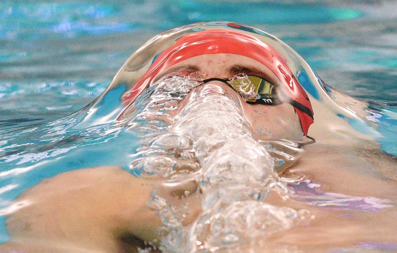 Hinsdale Central’s Josh Bey swims backstroke in the 200-yard medley relay during the 69th annual New Trier boys swimming relays on Saturday, Jan. 18, 2025 in Winnetka. The Red Devils set a meet record in the event with a time of 1:33.56.