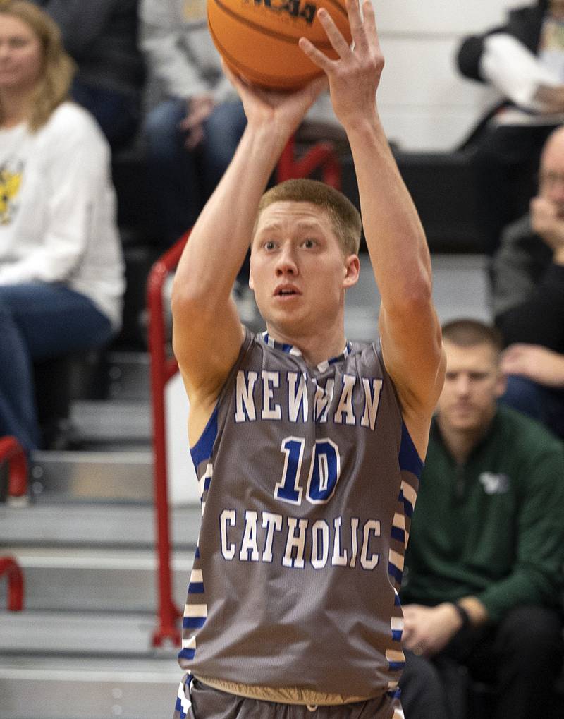 Newman’s George Jungerman puts up a three-point shot against Riverdale Tuesday, Dec. 30, 2025, in the final of the boys Cliff Warkins Basketball Tournament at Erie High School.