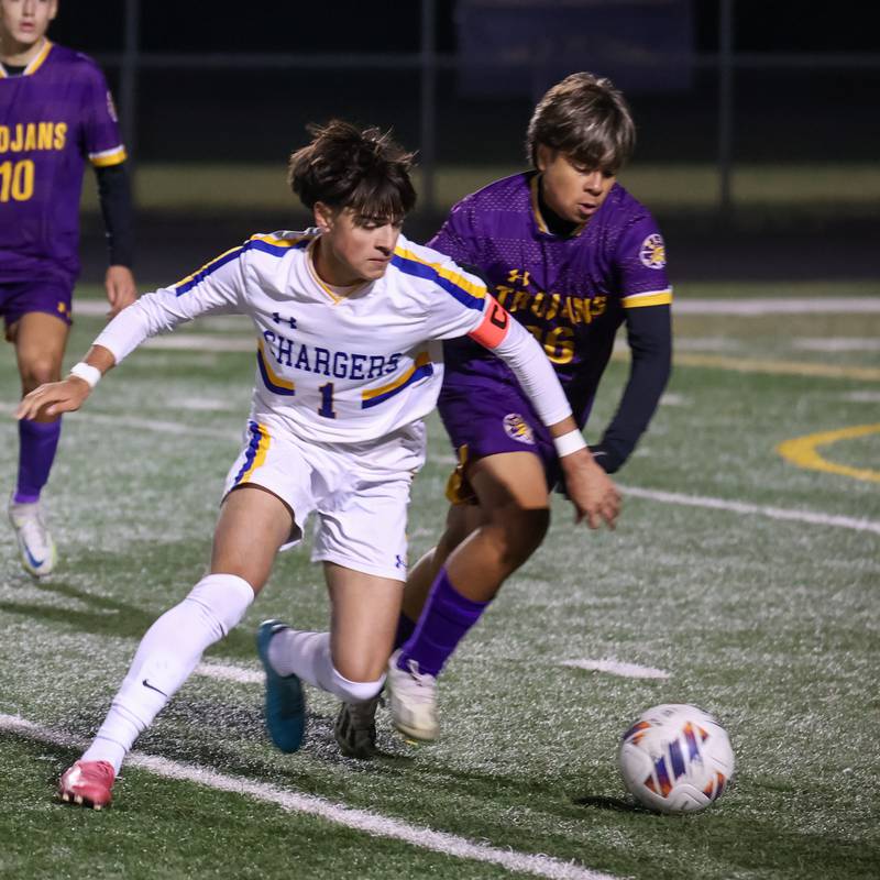 Mendota player fights for ball against Matthew VanDeman Aurora Central Catholic High School on Saturday, November 2, 2024 at Richard E. Phalen, SR. Field in Mendota.