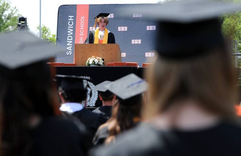Salutatorian Max Cryer speaks during Sandwich High School's graduation ceremony on the football field, Sunday, May 19, 2024.