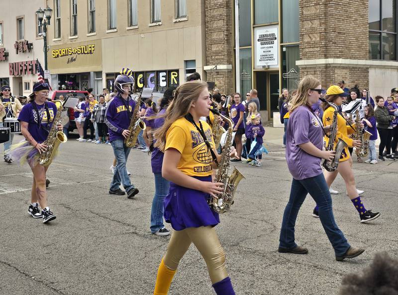 The Mendota High School marching band makes its way Friday, Sept. 27, 2024, through the homecoming parade.
